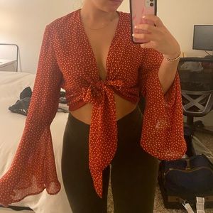 Orange tie top with flared sleeves